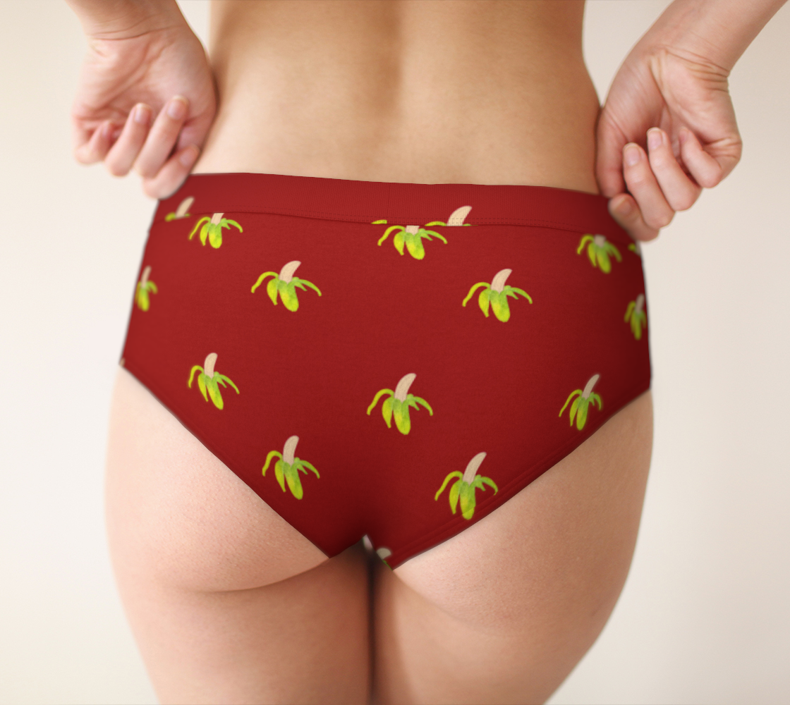 peeled banana on red cheeky briefs