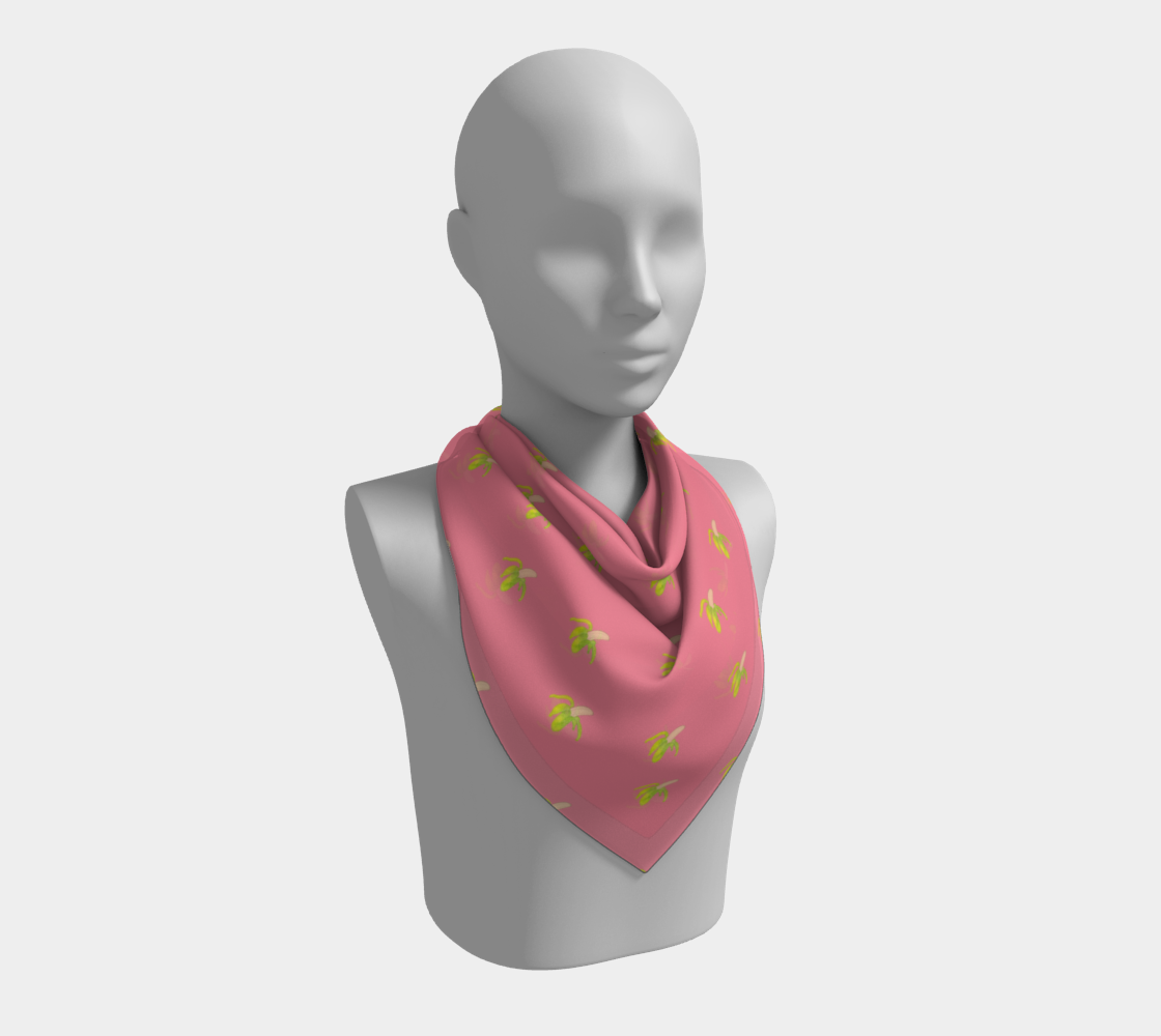 peeled banana on pink scarf