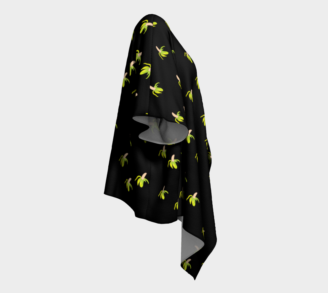 peeled banana on black draped Kimono